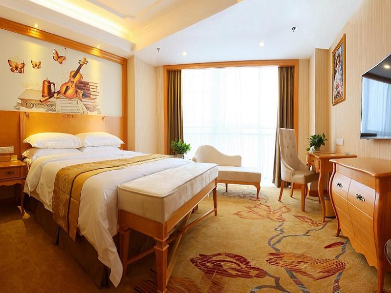 Vienna International Hotel Yantai Changjiang Road Xingyi Square Branch Екстер'єр фото