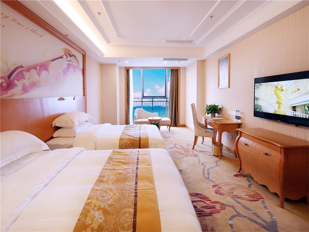 Vienna International Hotel Yantai Changjiang Road Xingyi Square Branch Екстер'єр фото