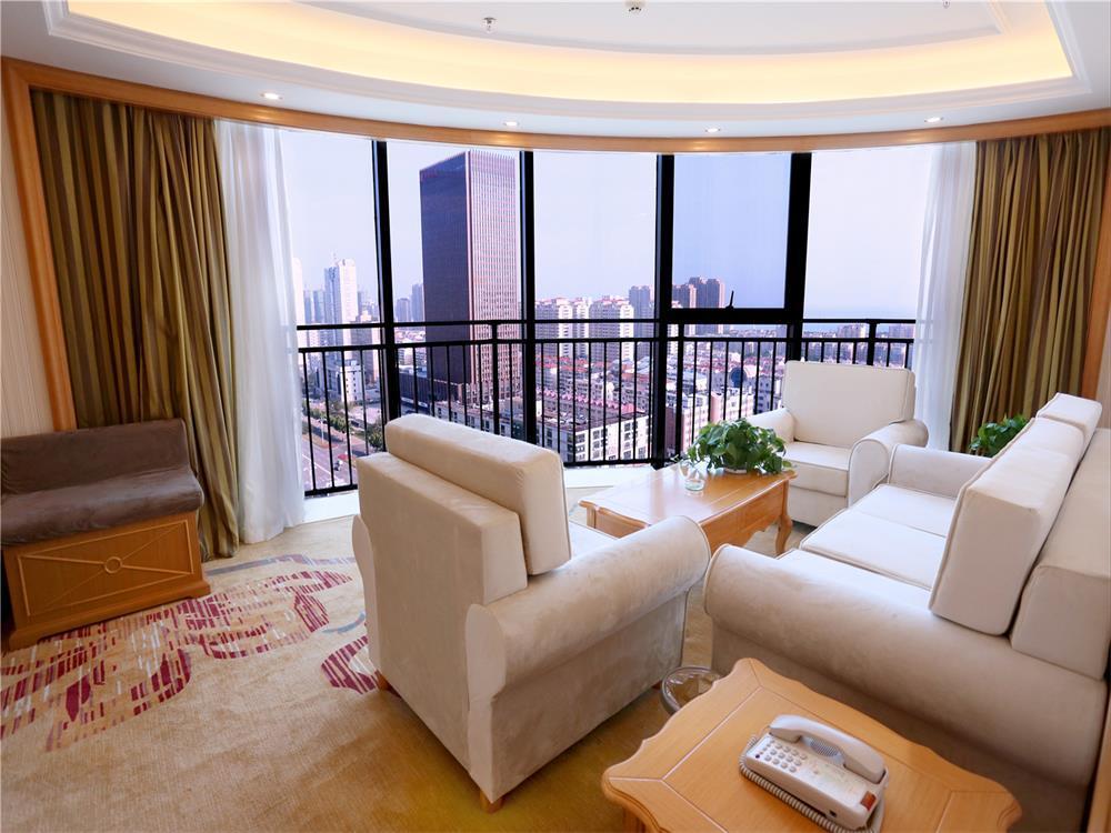 Vienna International Hotel Yantai Changjiang Road Xingyi Square Branch Екстер'єр фото